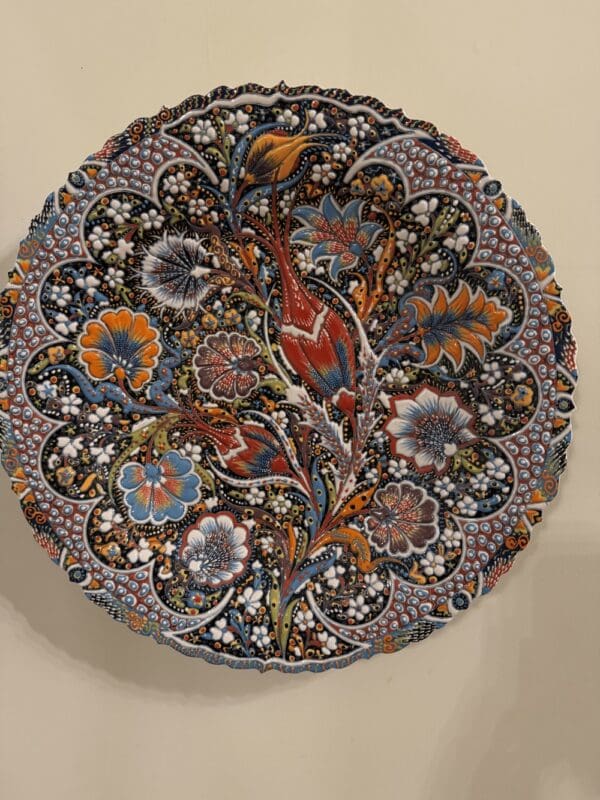 A ceramic plate with a floral design.